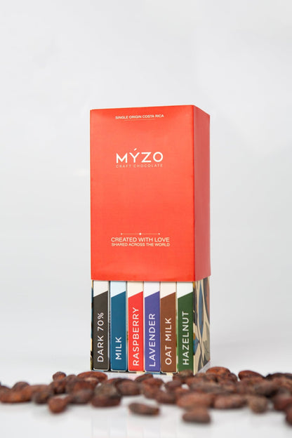 MYZO Bean-to-Bar Gift Box showing all six single-origin chocolate varieties arranged together