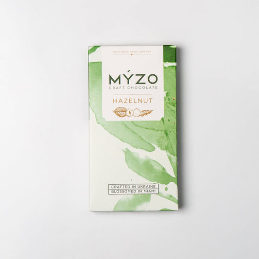 MYZO hazelnut dark chocolate bar with whole roasted hazelnuts and 70% cacao