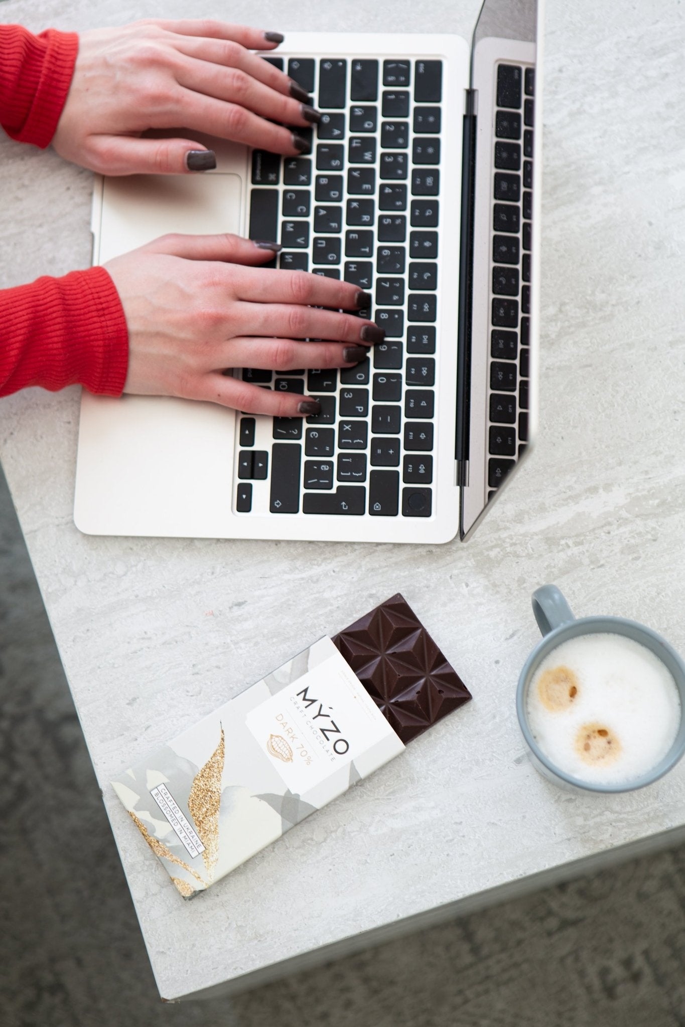 Pack of 6 MYZO 70% Dark Chocolate bars stacked for gifting or sharing